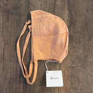 Light orange baby bonnet NWT